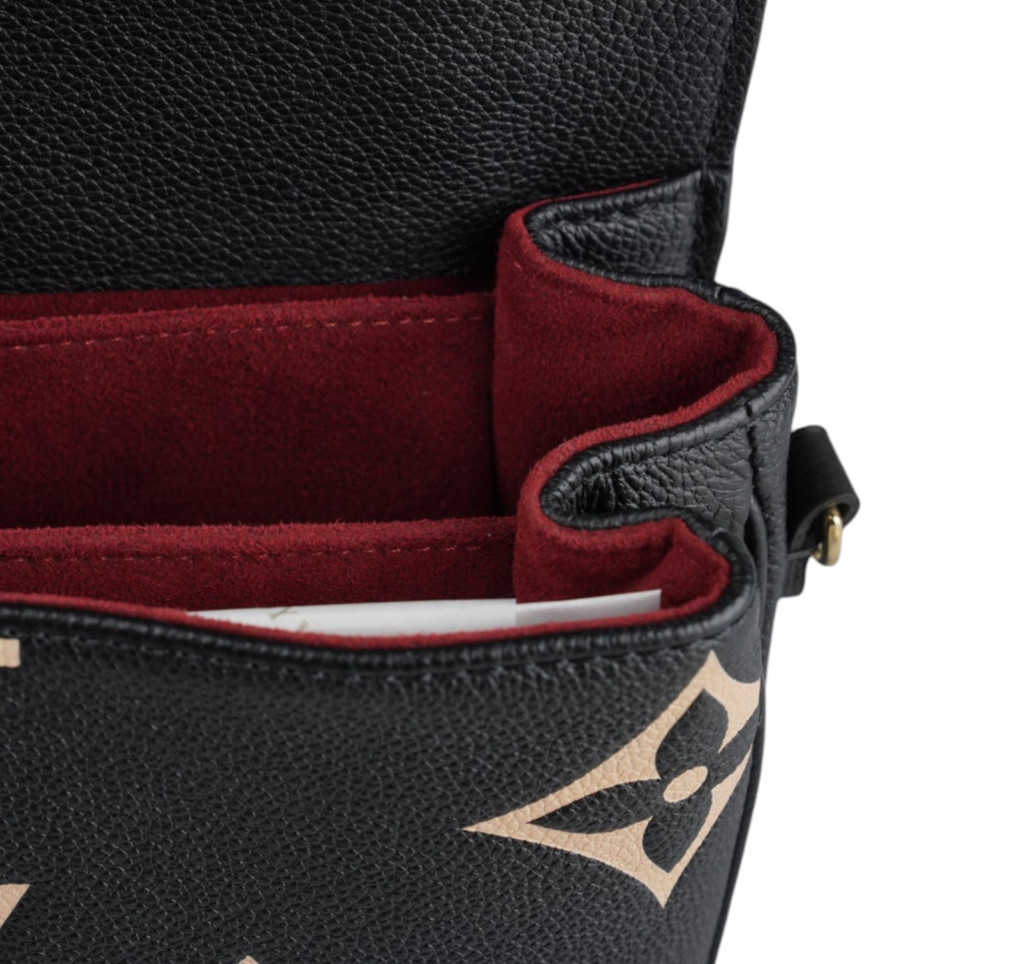 Metis clutch bag