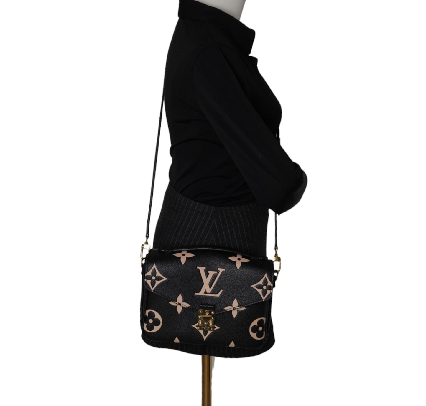 Metis clutch bag