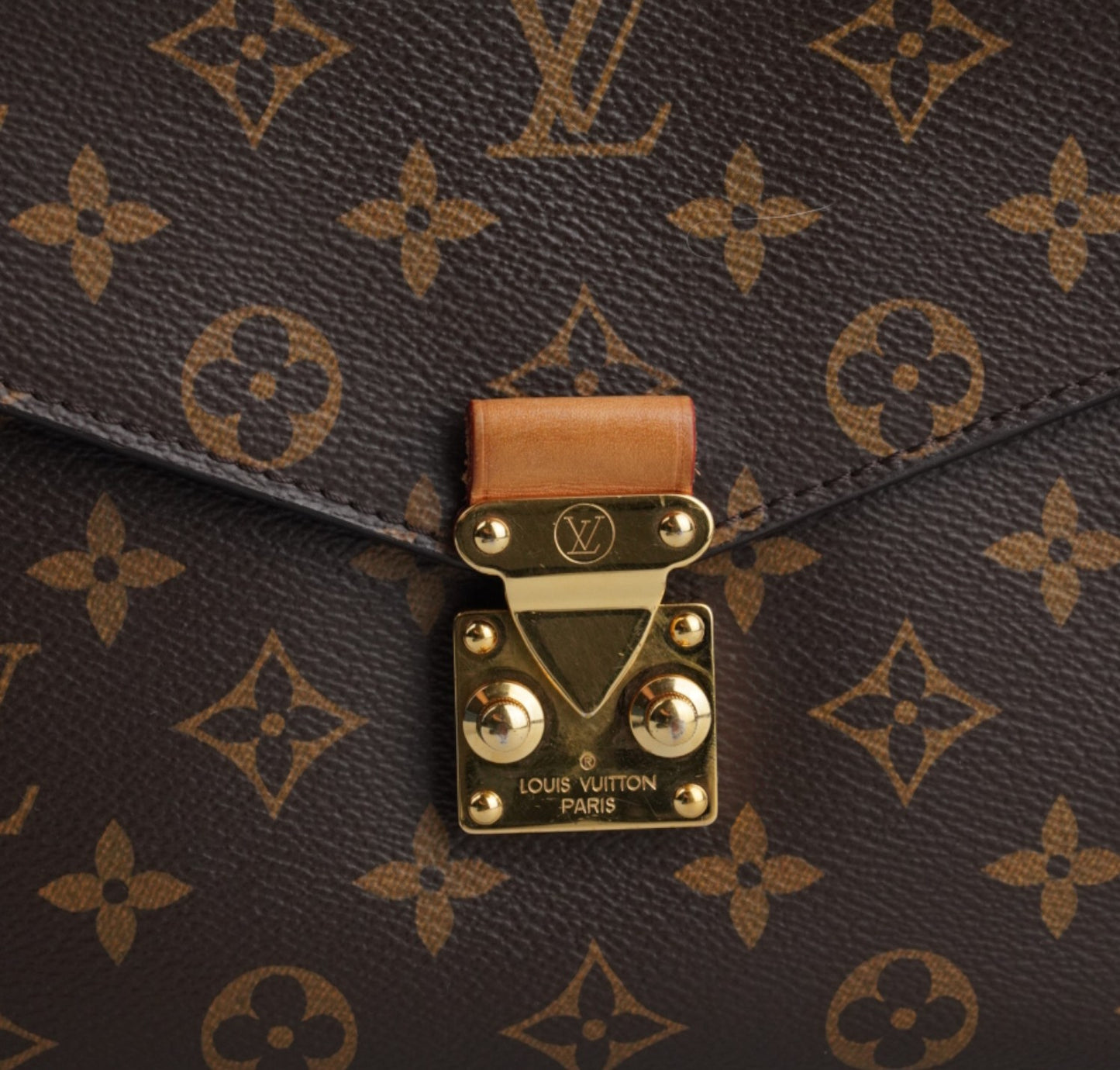 Metis Monogram Clutch