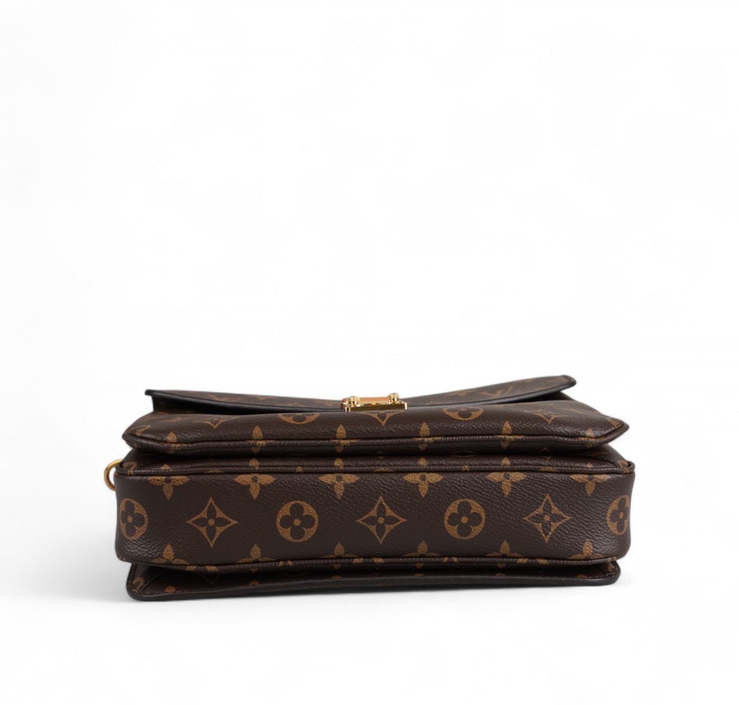 Metis Monogram Clutch