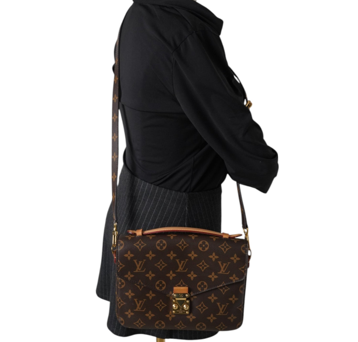 Metis Monogram Clutch