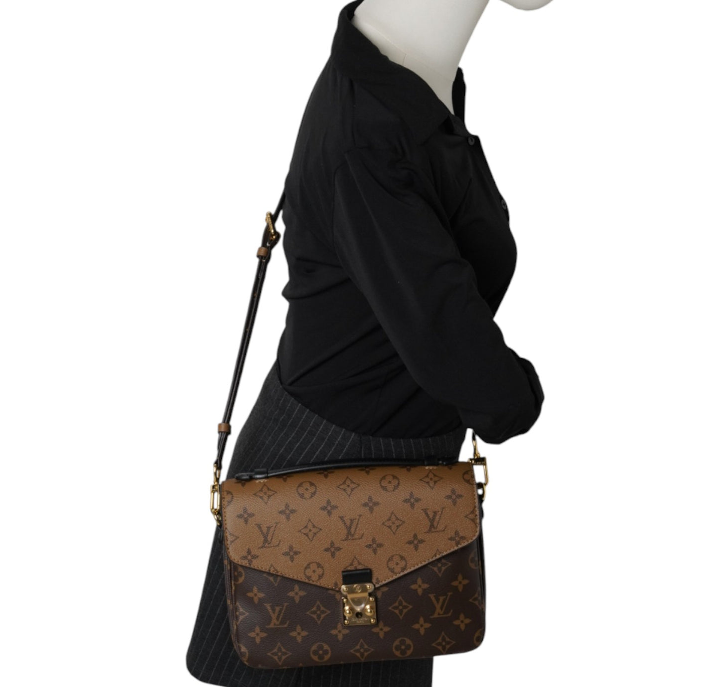 Métis Monogram Reverse clutch bag