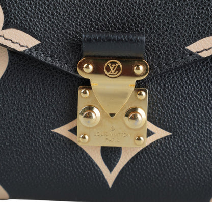Metis clutch bag
