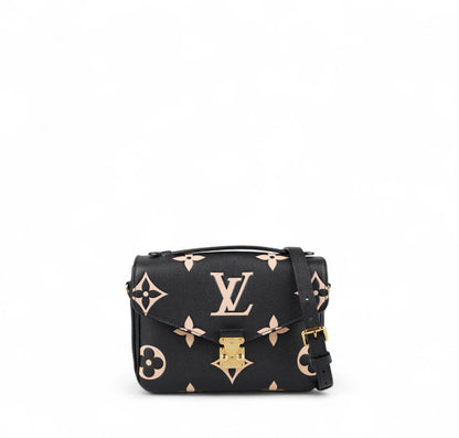 Metis clutch bag