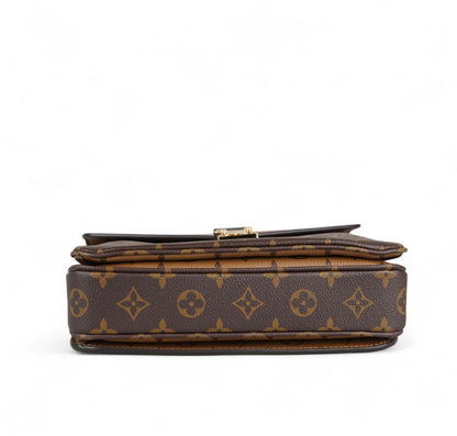 Métis Monogram Reverse clutch bag