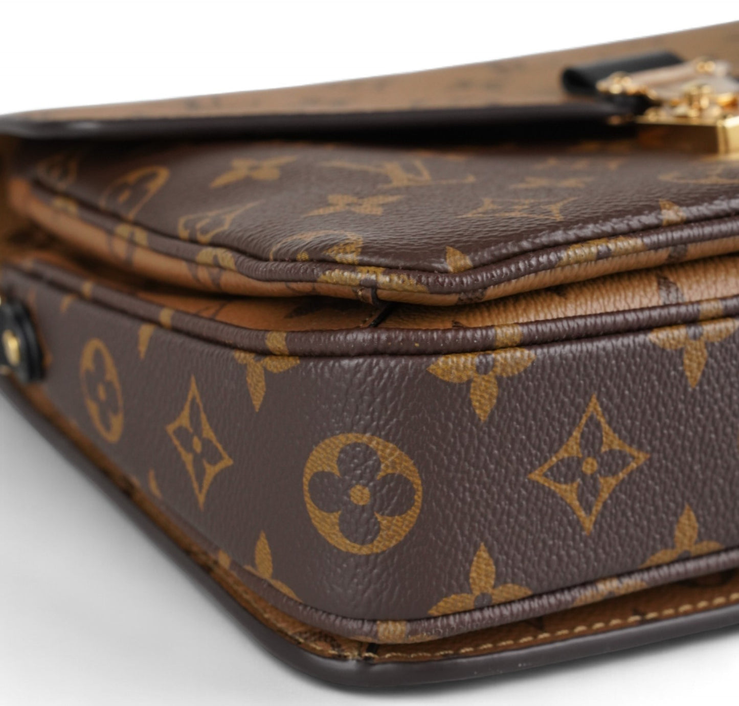 Métis Monogram Reverse clutch bag