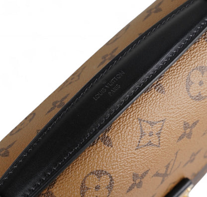 Métis Monogram Reverse clutch bag