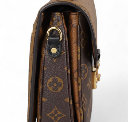 Métis Monogram Reverse clutch bag