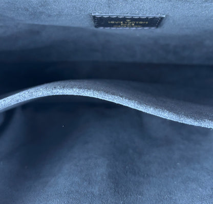 Métis Monogram Reverse clutch bag