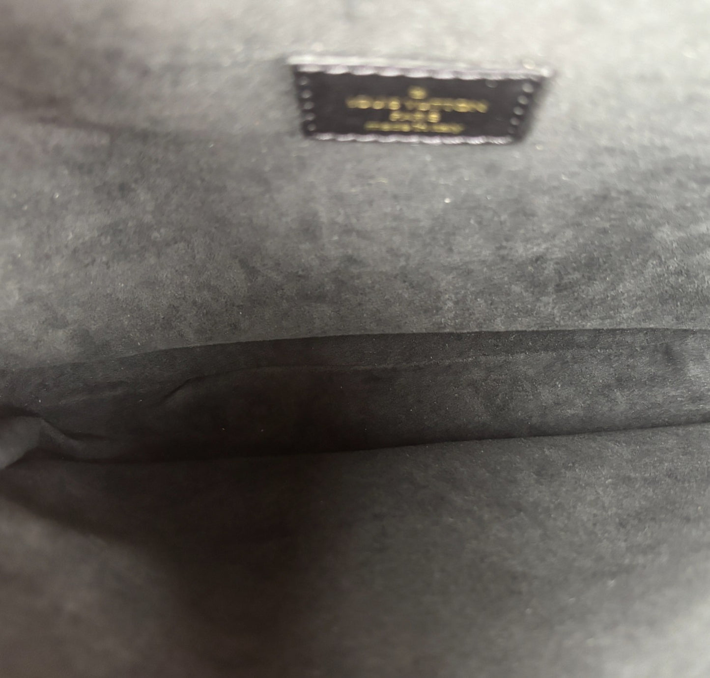 Métis Monogram Reverse clutch bag