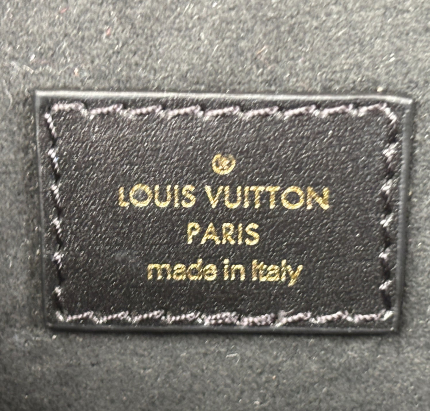 Métis Monogram Reverse clutch bag