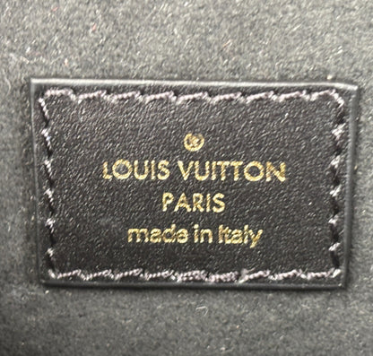 Métis Monogram Reverse clutch bag