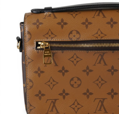 Métis Monogram Reverse clutch bag