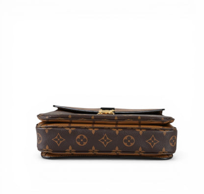 Métis Monogram Reverse clutch bag