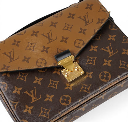 Métis Monogram Reverse clutch bag
