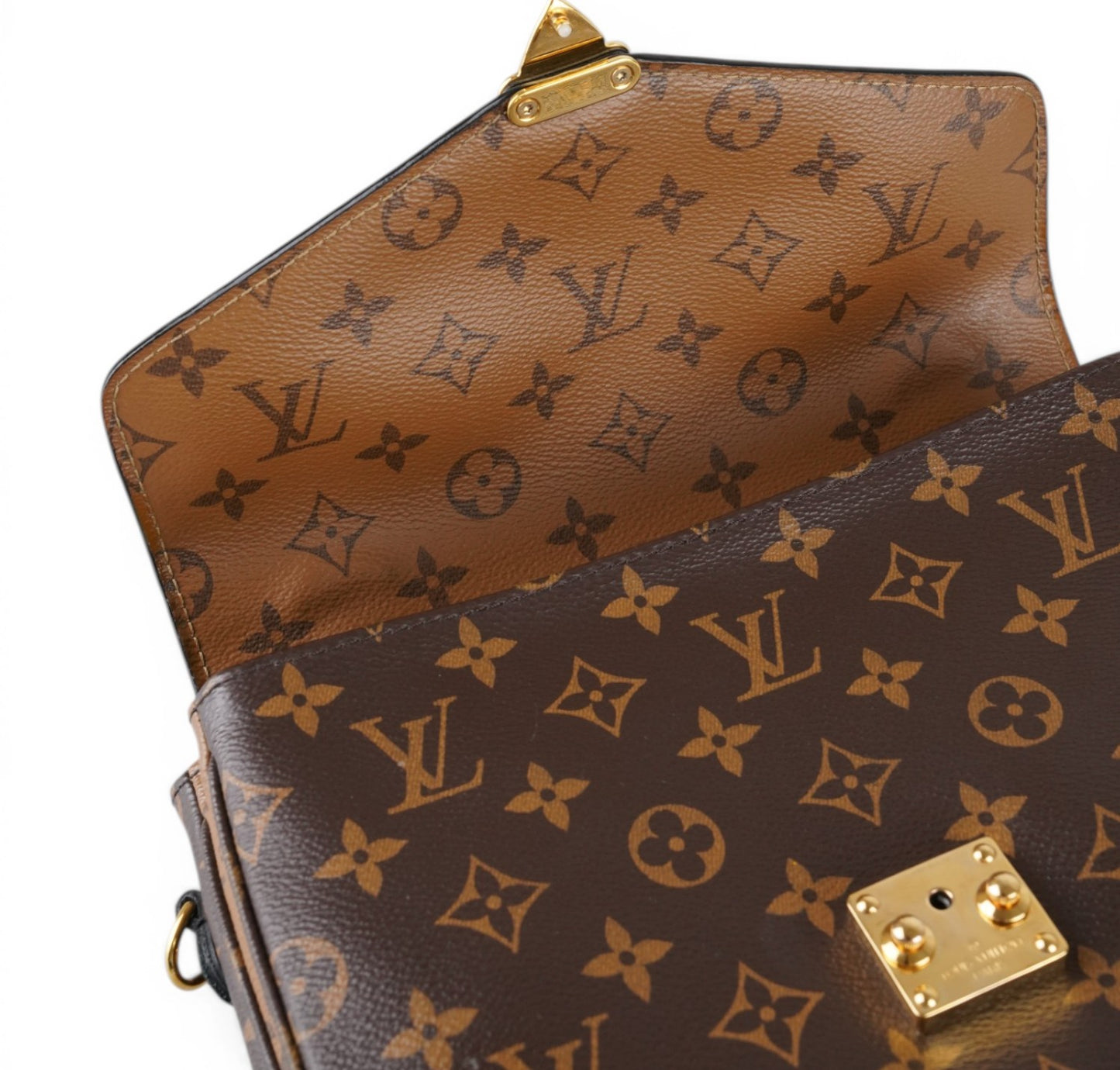 Métis Monogram Reverse clutch bag