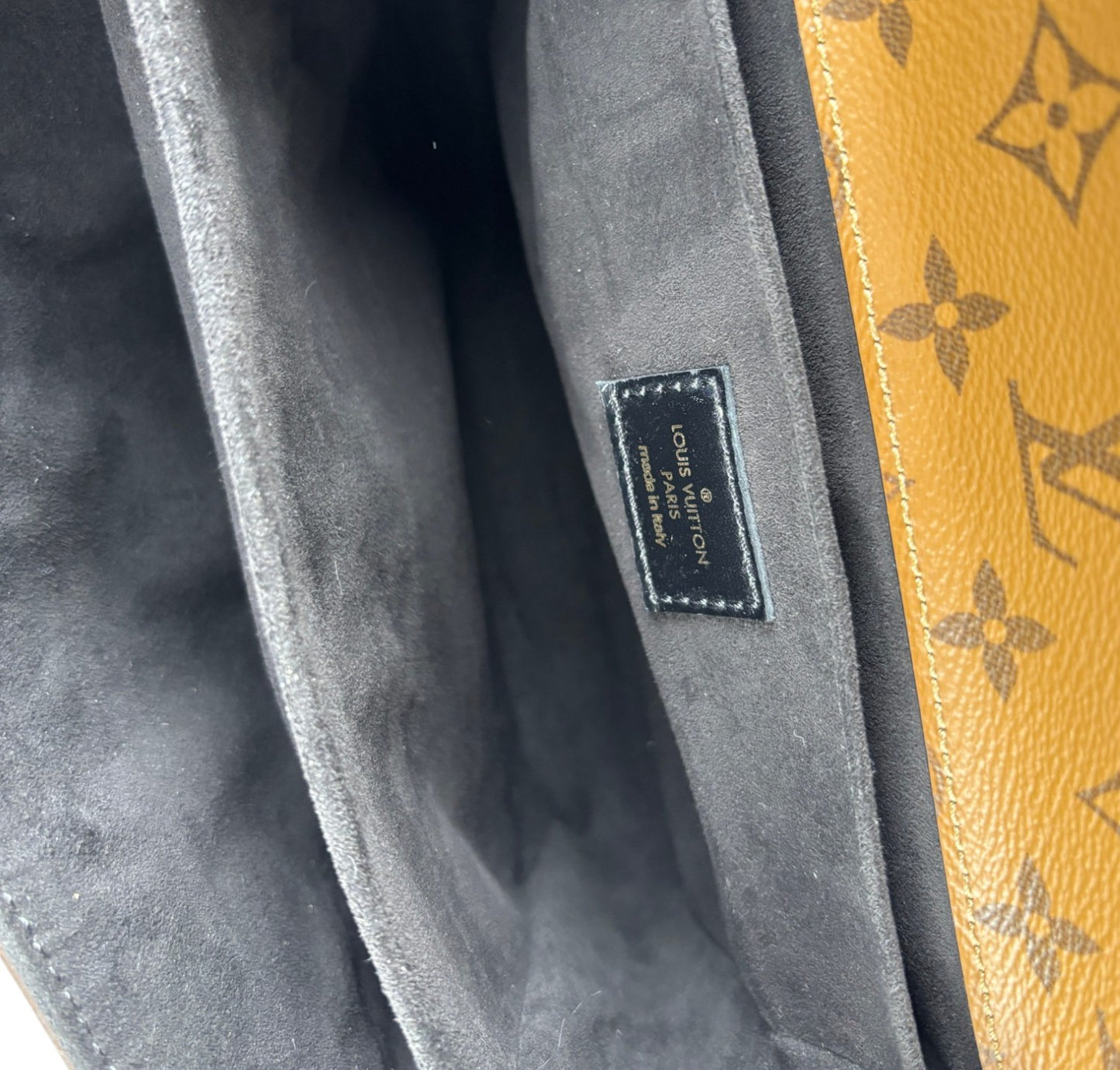 Métis Monogram Reverse clutch bag