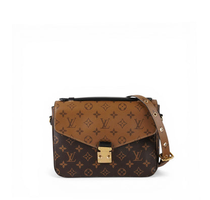 Métis Monogram Reverse clutch bag